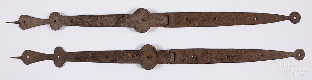 Appraisal: Pair of wrought iron strap hinges Pair of wrought iron