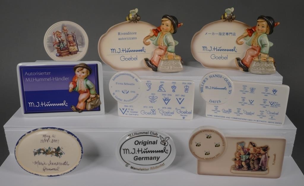 Appraisal: Collection of Hummel advertising and dealer plaques Plaques include Merry