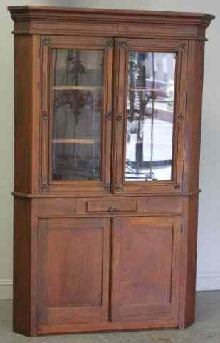 Appraisal: American Victorian Walnut Corner Cabinet With glazed top and shaped