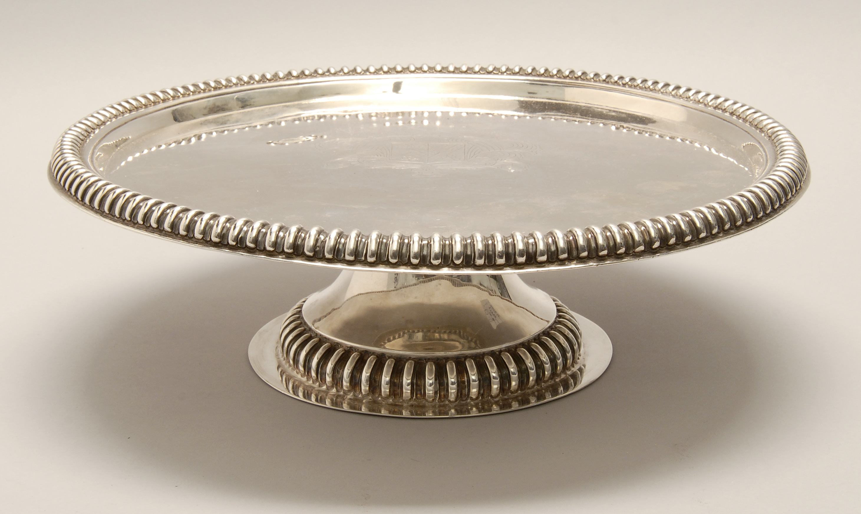 Appraisal: CONTINENTAL SILVER CHARGER Late th CenturyWith reeded rim Crest engraved