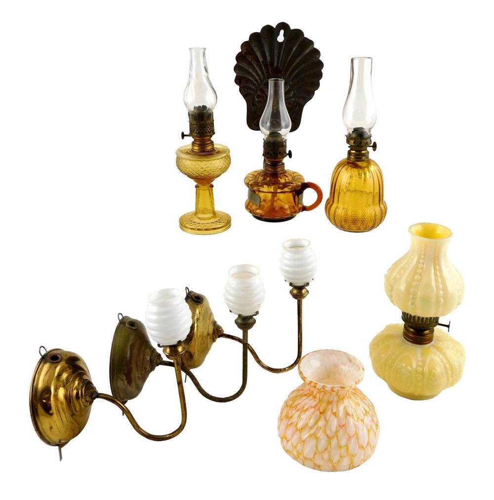 Appraisal: Miniature oil lamps all with yellow amber or white glass