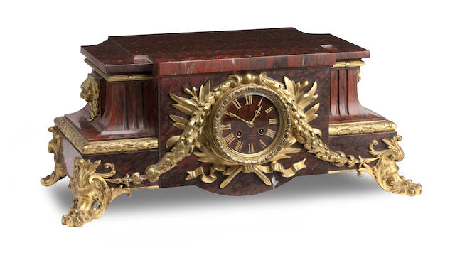 Appraisal: An impressive red marble and ormolu mounted mantel clock Inscribed