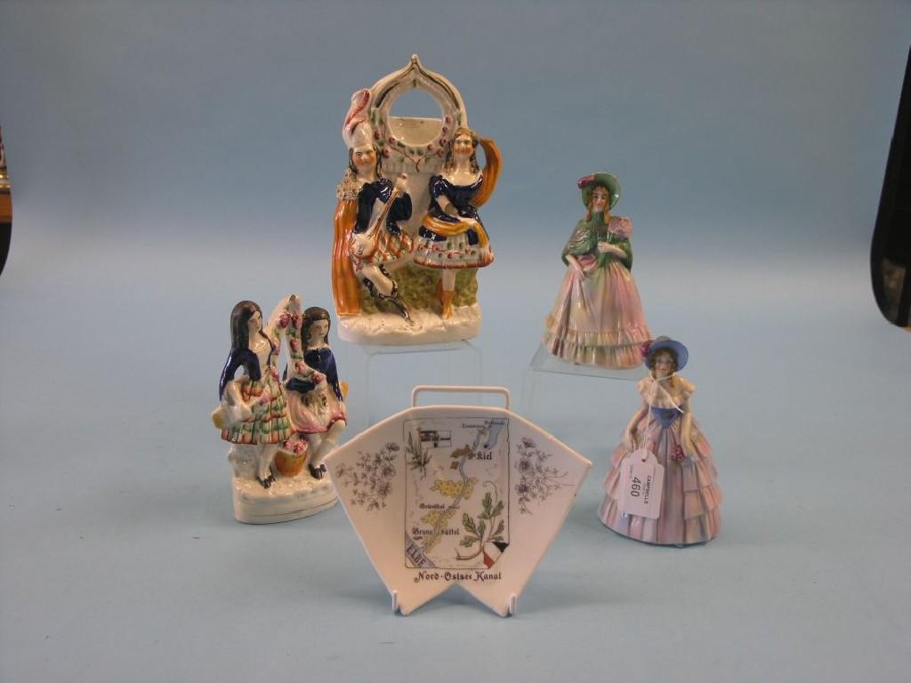 Appraisal: A Victorian Staffordshire pottery figural watch-stand in one other Staffordshire