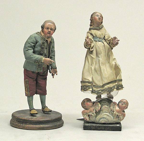 Appraisal: Two Italian polychrome composition and fabric cr che figures th