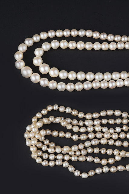 Appraisal: A DOUBLE STRAND CULTURED PEARL NECKLACE with paste set clasp