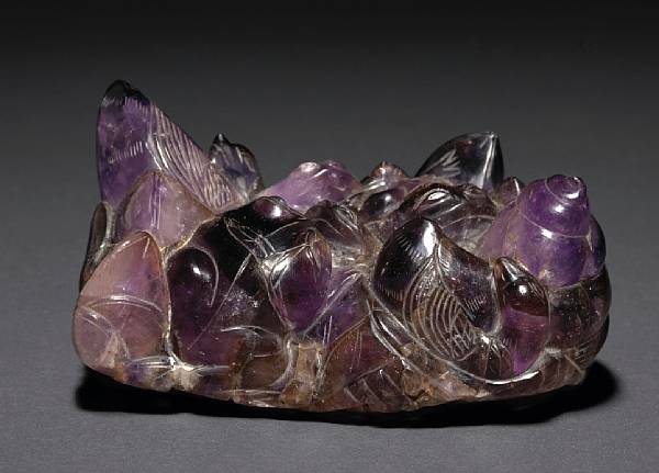 Appraisal: An amethyst lotus and animal carving th Century Depicting frogs