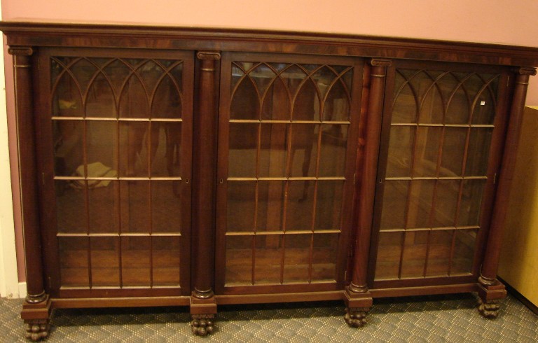 Appraisal: Mahogany door with arched mullions column front paw feet circa