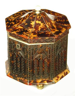 Appraisal: A George IV tortoiseshell octagonal tea caddy with white metal