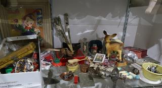 Appraisal: One shelf containing associated decoratives including doll house and toy