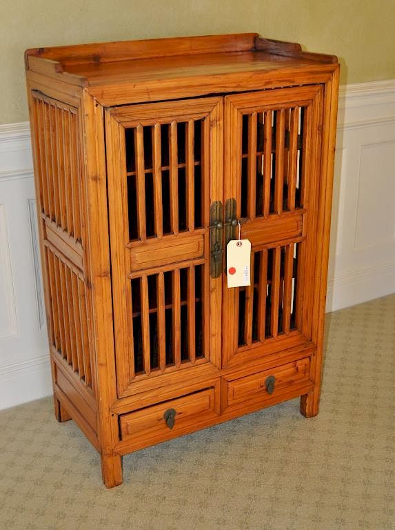 Appraisal: Chinese Slatted Food Cabinet with pair of cabinet doors over