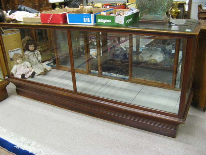 Appraisal: ANTIQUE OAK AND GLASS SHOWCASE Dimensions H x L x