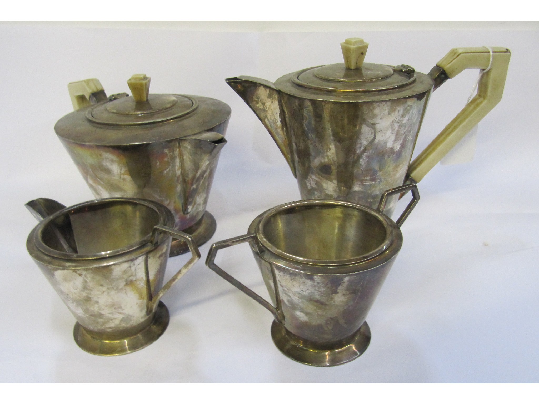 Appraisal: An Art Deco EPNS four piece tea service