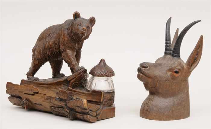 Appraisal: TWO BLACK FOREST CARVED WOOD INKWELLS The one with a