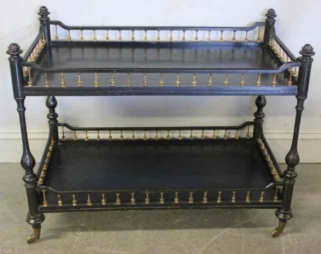 Appraisal: Small Victorian Ebonized Tier Table With gilded turned wood gallery