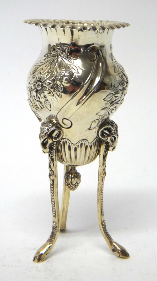 Appraisal: A Victorian silver vase with floral and foliate embossed decoration