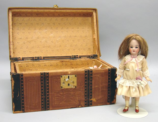 Appraisal: Lot Unmarked doll Replaced brown HH wig is heavily glued