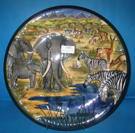 Appraisal: Moorcroft Plaque decorated in the Safari Design Limited edition of