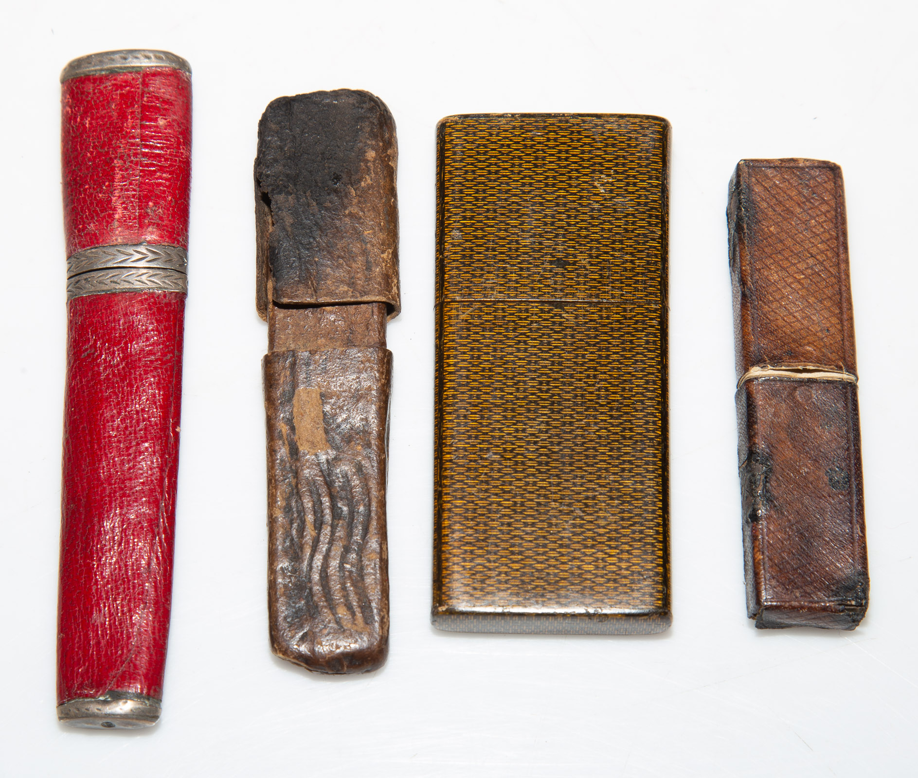 Appraisal: THREE LEATHER A LACQUER-CASED LANCETS The leather cases with a