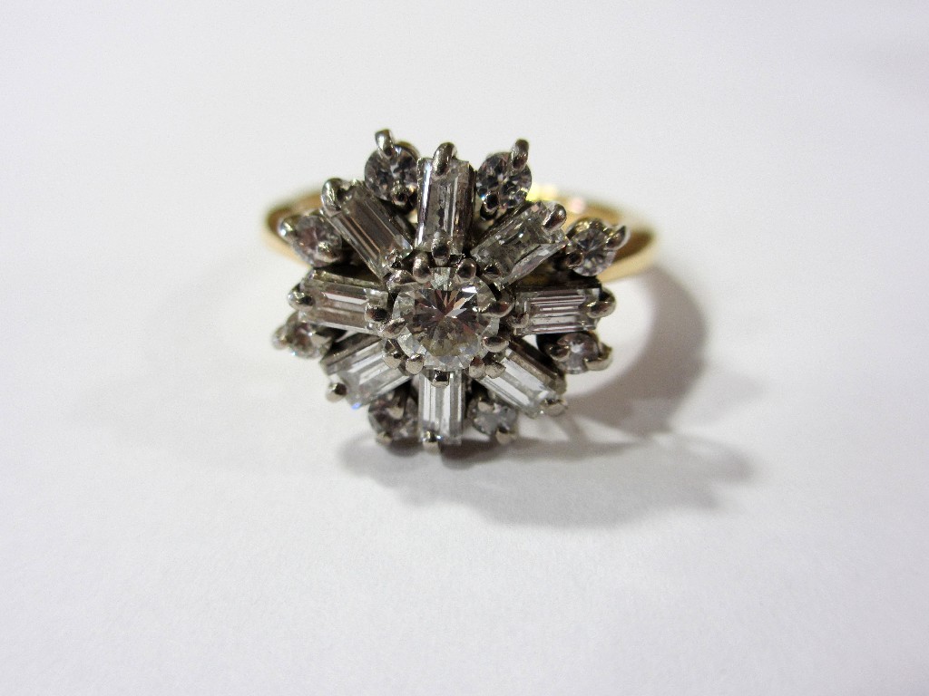 Appraisal: A large diamond circular cluster ring with central brilliant of