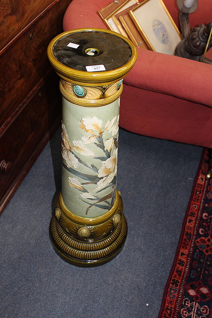 Appraisal: A BURMANTOFTS MAJOLICA JARDINIERE STAND decorated with flag iris cm