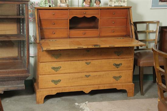 Appraisal: TWO PIECE SLANT LID DESK Curly maple having a paneled