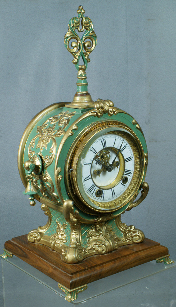 Appraisal: Ansonia painted white metal mantle clock with enameled open escapement