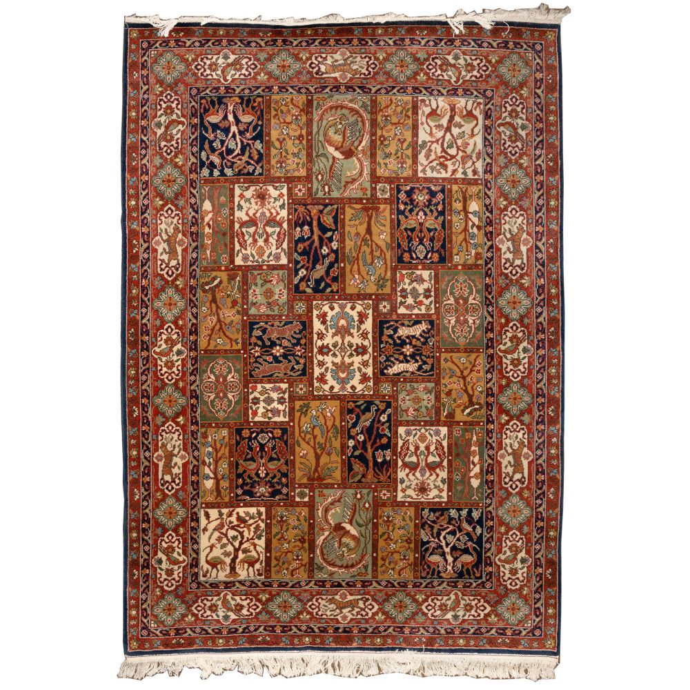 Appraisal: PERSIAN WOOL RUGHandwoven having an avian motif in hues of