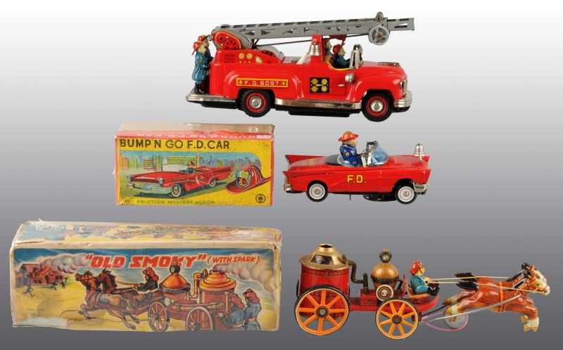 Appraisal: Lot of Tin Litho Fire Department Toys Description Japanese Working