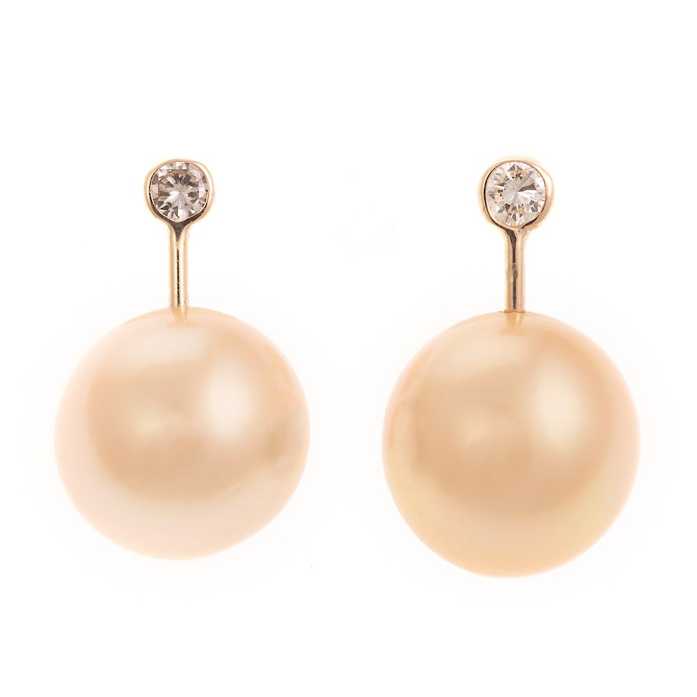 Appraisal: A Pair of Golden South Sea Pearl Diamond Earrings K