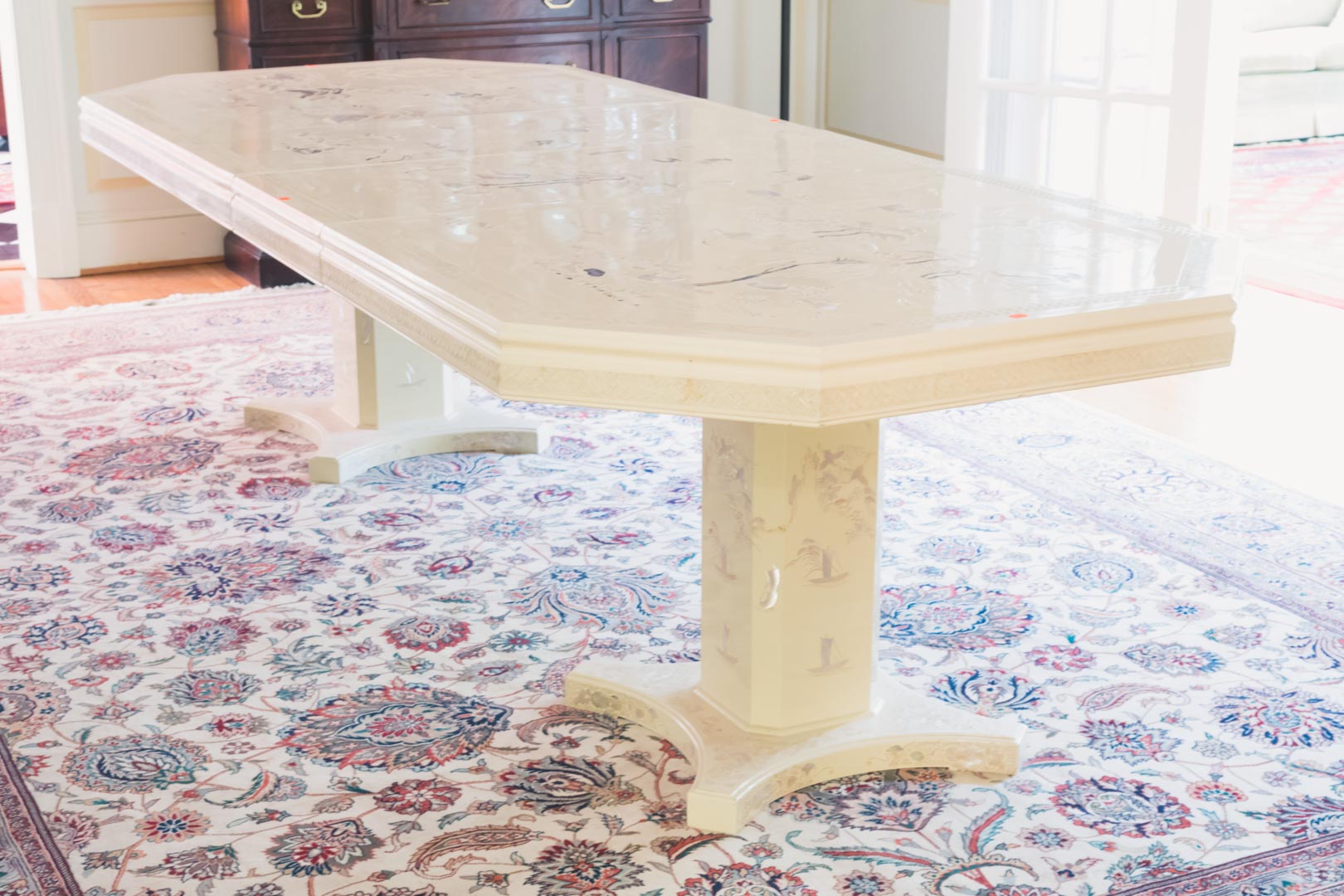 Appraisal: Mother-of-pearl inlay cream lacquered dining table in H in L