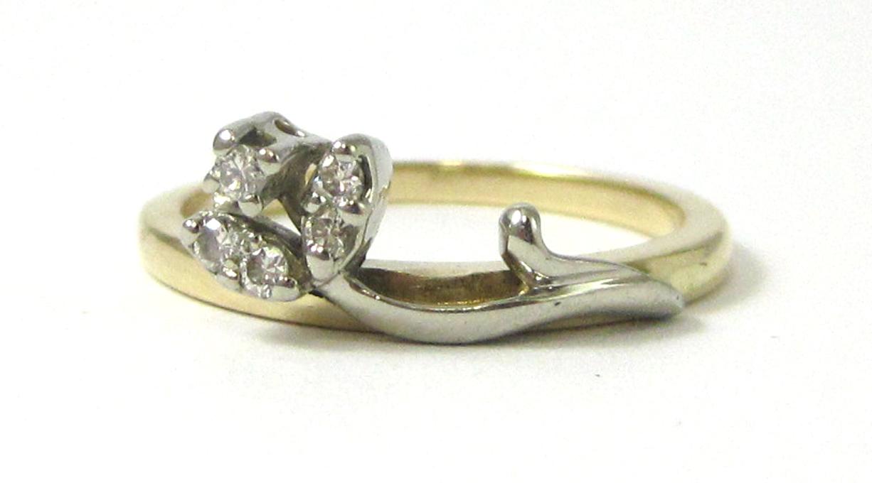 Appraisal: DIAMOND AND FOURTEEN KARAT GOLD RING set with five round-cut