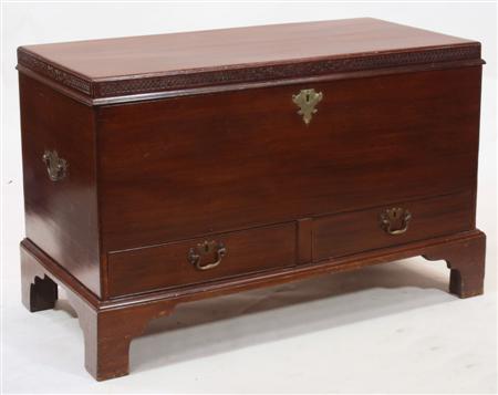 Appraisal: A Georgian style mahogany blanket box the moulded rectangular top