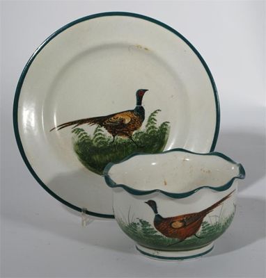 Appraisal: Pheasant' a Wemyss Pottery plate painted in colours and a