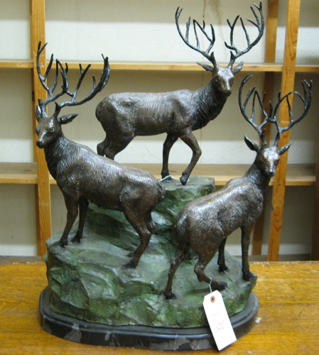 Appraisal: BRONZE WILDLIFE SCULPTURE three elk standing together on a rock