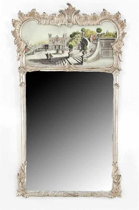 Appraisal: Rococo style silver-leafed mirror by Palladio silver-gilded two-part frame in