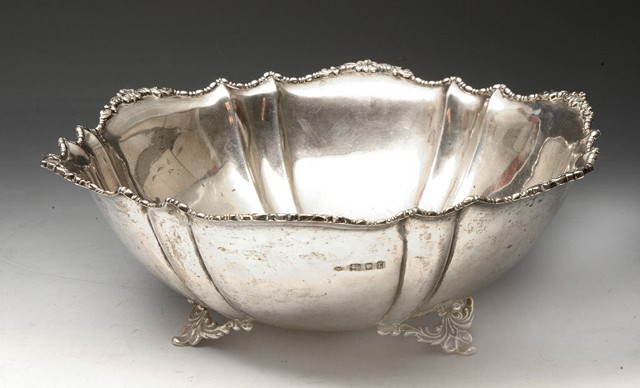 Appraisal: A OPEN SILVER BOWL of stylised hexagonal form with shaped