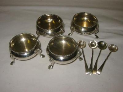 Appraisal: A SET OF FOUR VICTORIAN SALTS of bellied circular form