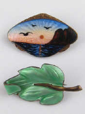 Appraisal: Two Scandinavian silver enamelled brooches each approx cm