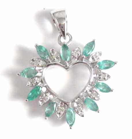 Appraisal: EMERALD AND DIAMOND HEART PENDANT The k white gold open