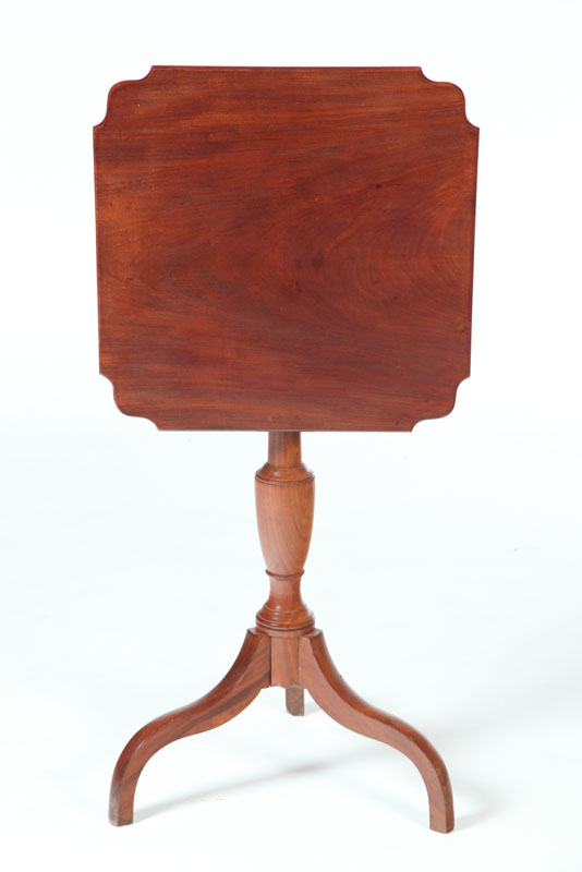 Appraisal: FEDERAL TILT-TOP CANDLESTAND American early th century mahogany Shaped top