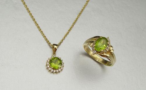 Appraisal: K PERIDOT DIAMOND RING AND NECKLACE SET One Oval mixed