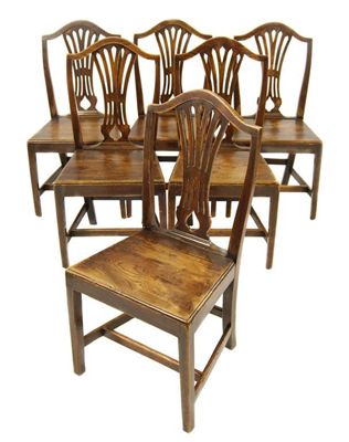 Appraisal: A set of six George III elm side chairs each