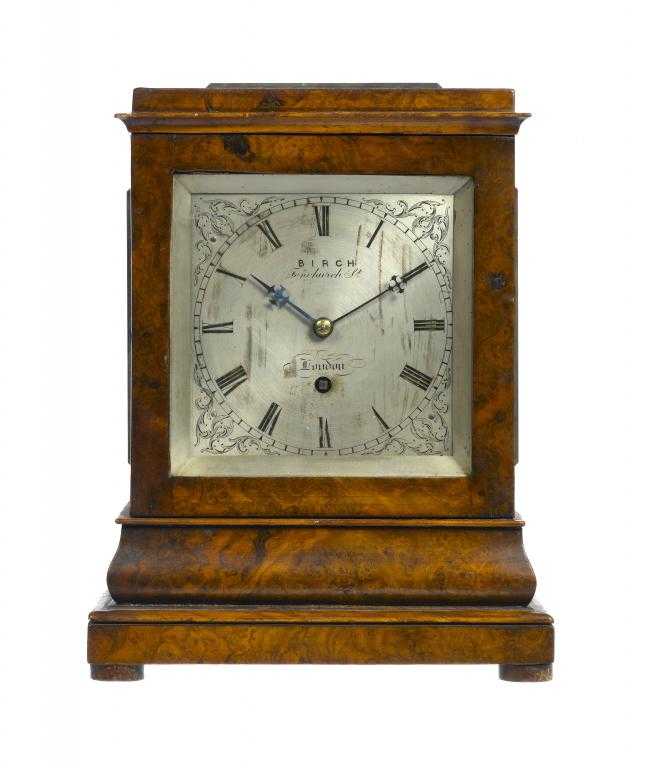 Appraisal: A VICTORIAN BURR WALNUT MANTEL TIMEPIECE signed on the silvered