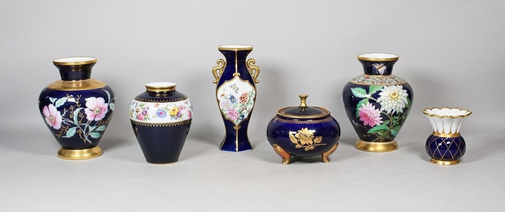 Appraisal: urns vases and a footed jar marked Porcelana Schmidt signed