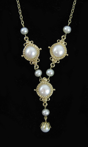 Appraisal: PEARL AND FOURTEEN KARAT GOLD NECKLACE measuring inches in length