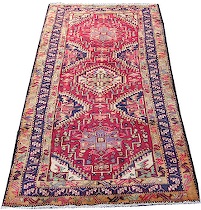 Appraisal: A Shirvan Rug A striking Shirvan rug the geometric pattern