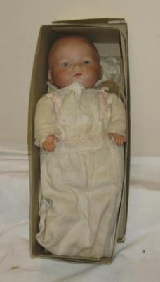 Appraisal: An Armand Marseille bisque head baby doll with blue glass