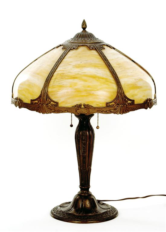 Appraisal: American slag glass-shaded table lamp mottled shaped panels of glass