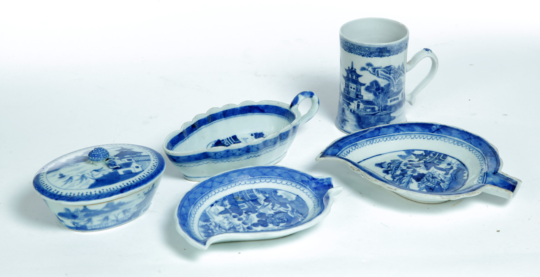 Appraisal: FIVE PIECES OF CANTON China th century Two leaf -shaped