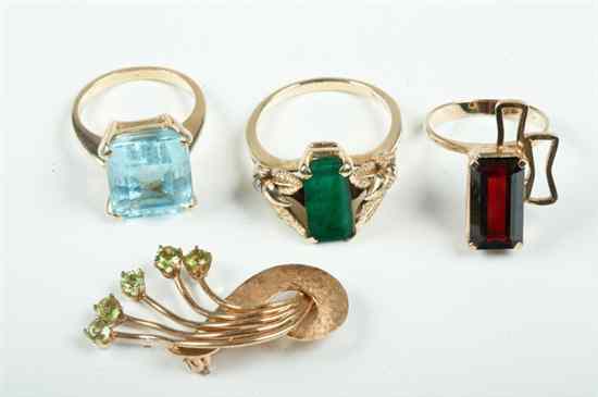 Appraisal: FOUR PEICES K YELLOW GOLD AND GEMSTONE JEWELRY Three contemporary